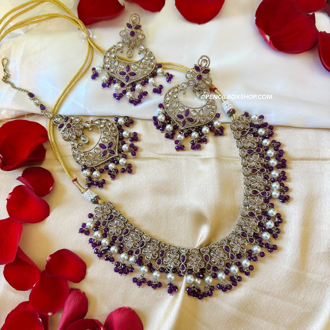 Aarohi Purple Golden Polki Necklace Set with maangtikka