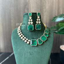 Load image into Gallery viewer, Tayani Gold plated Emerald Green Doublet Half n half Premium Statement Necklace set
