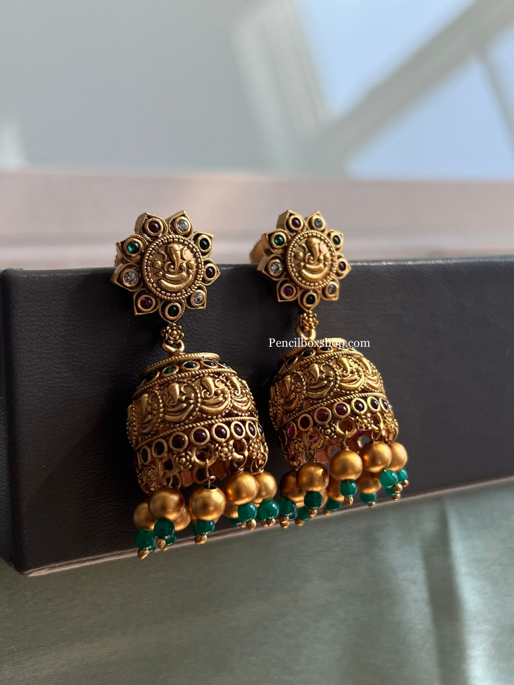 Ganesha Kemp Multicolor Stone jhumka earrings