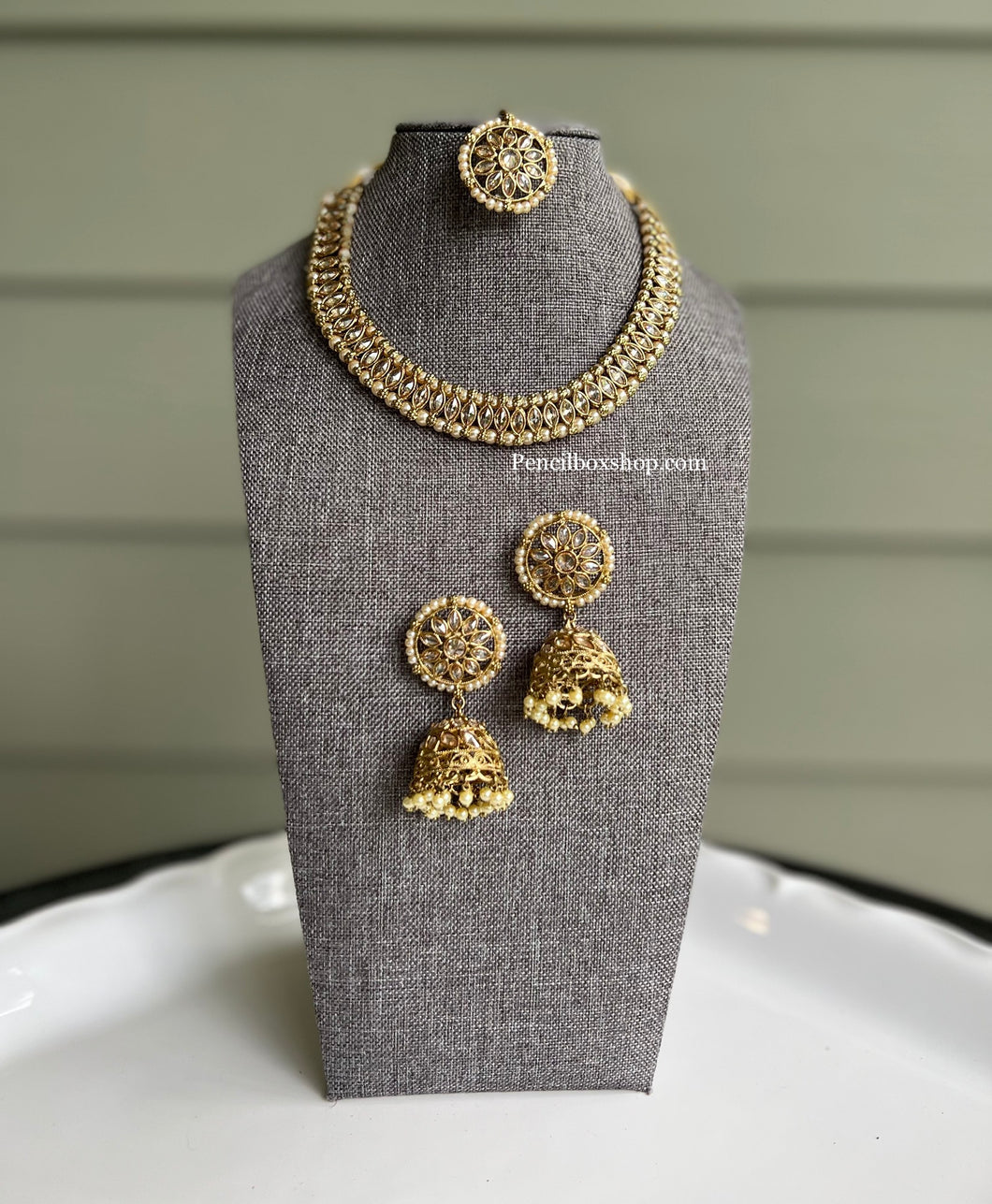 Golden polki Single line Neckline Necklace set with jhumkas and maangtikka